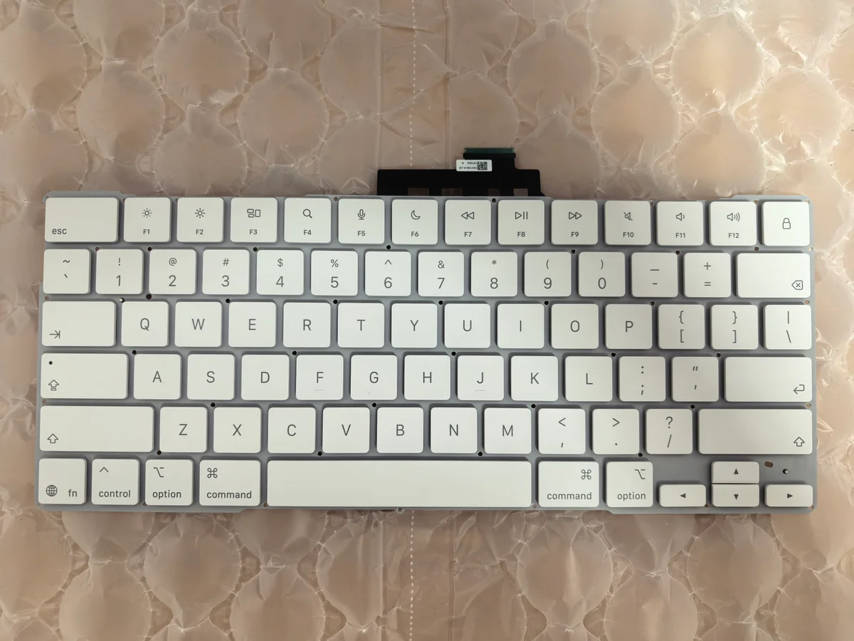 MacBook Neo A3404 keyboard with/out fingerprint 3
