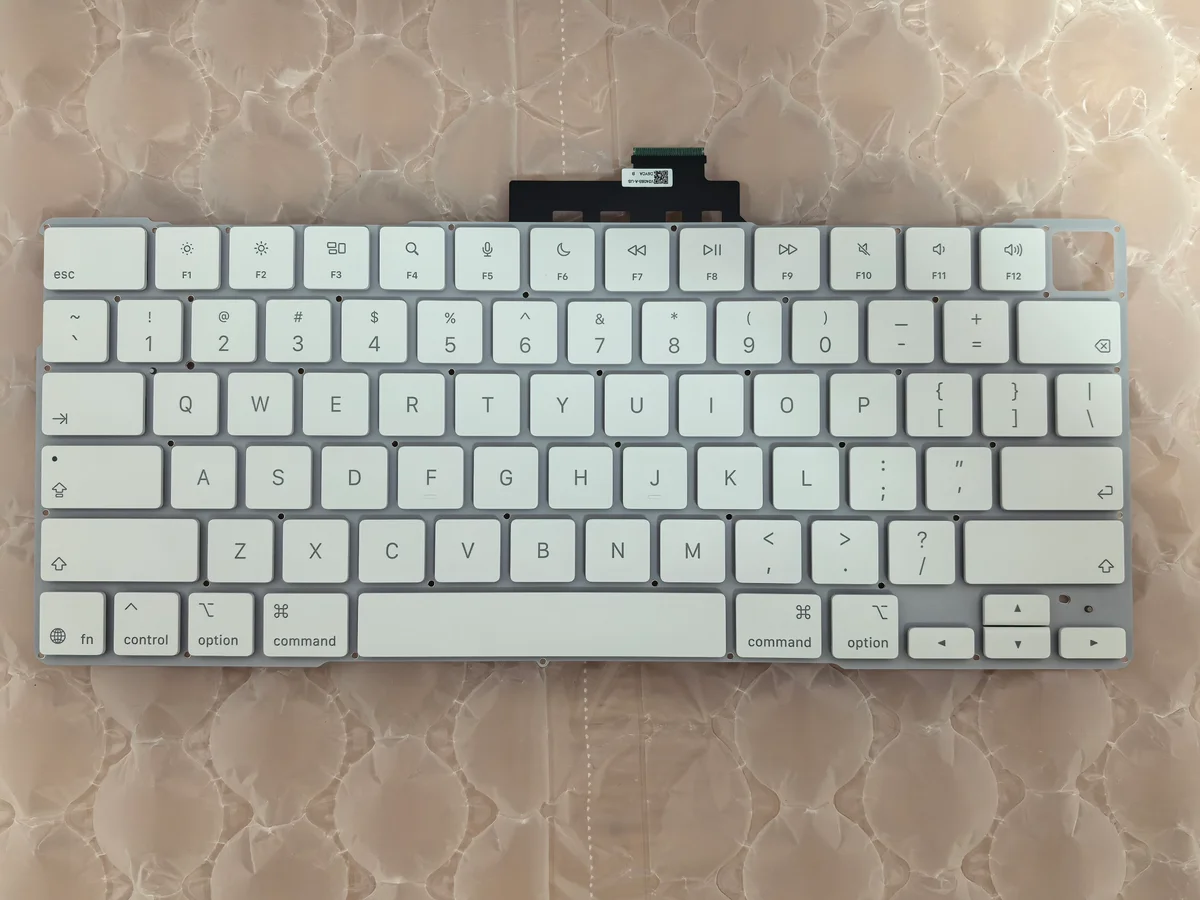 MacBook Neo A3404 keyboard with/out fingerprint 7